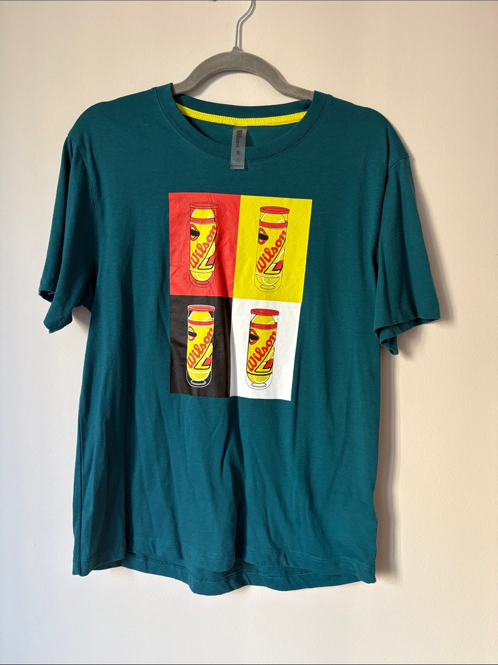 Wilson Teal Short Sleeve Tee with Red, Yellow, Black and White Pop Art Cans